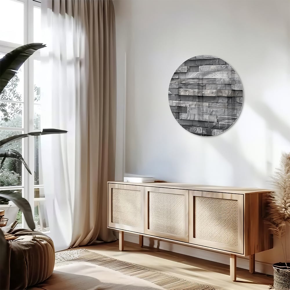 Moderne glazen schilderij met grijze texturen aan een lichte muur.