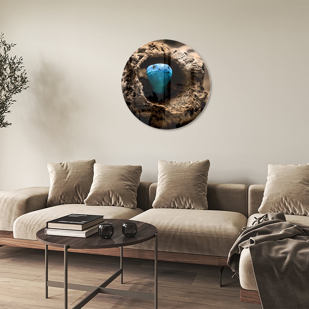 Glas schilderij met een blauwe parel in een nest, stijlvol en modern.